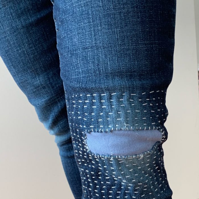 visible mending on jeans