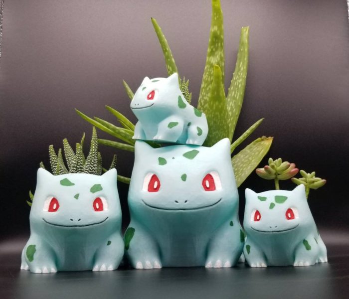 Pokemon vases of various sizes with cacti